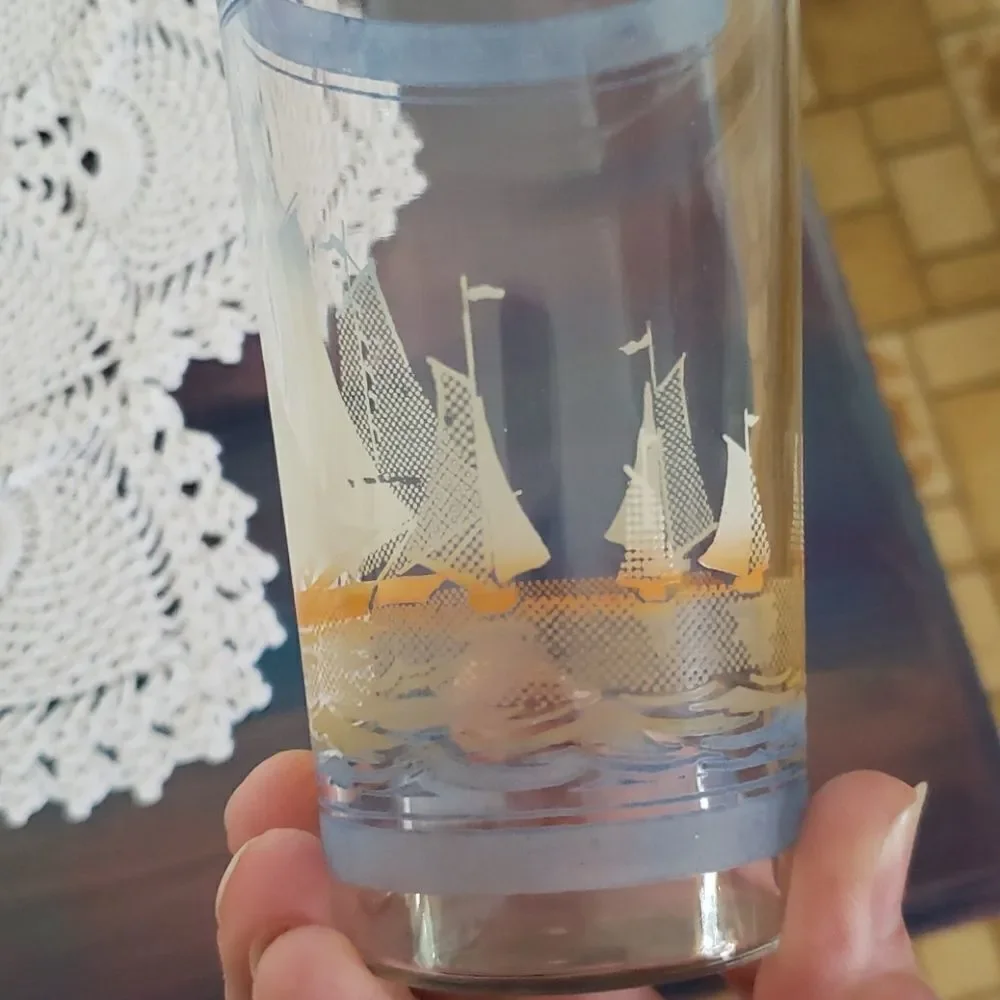 Vintage set sailboat